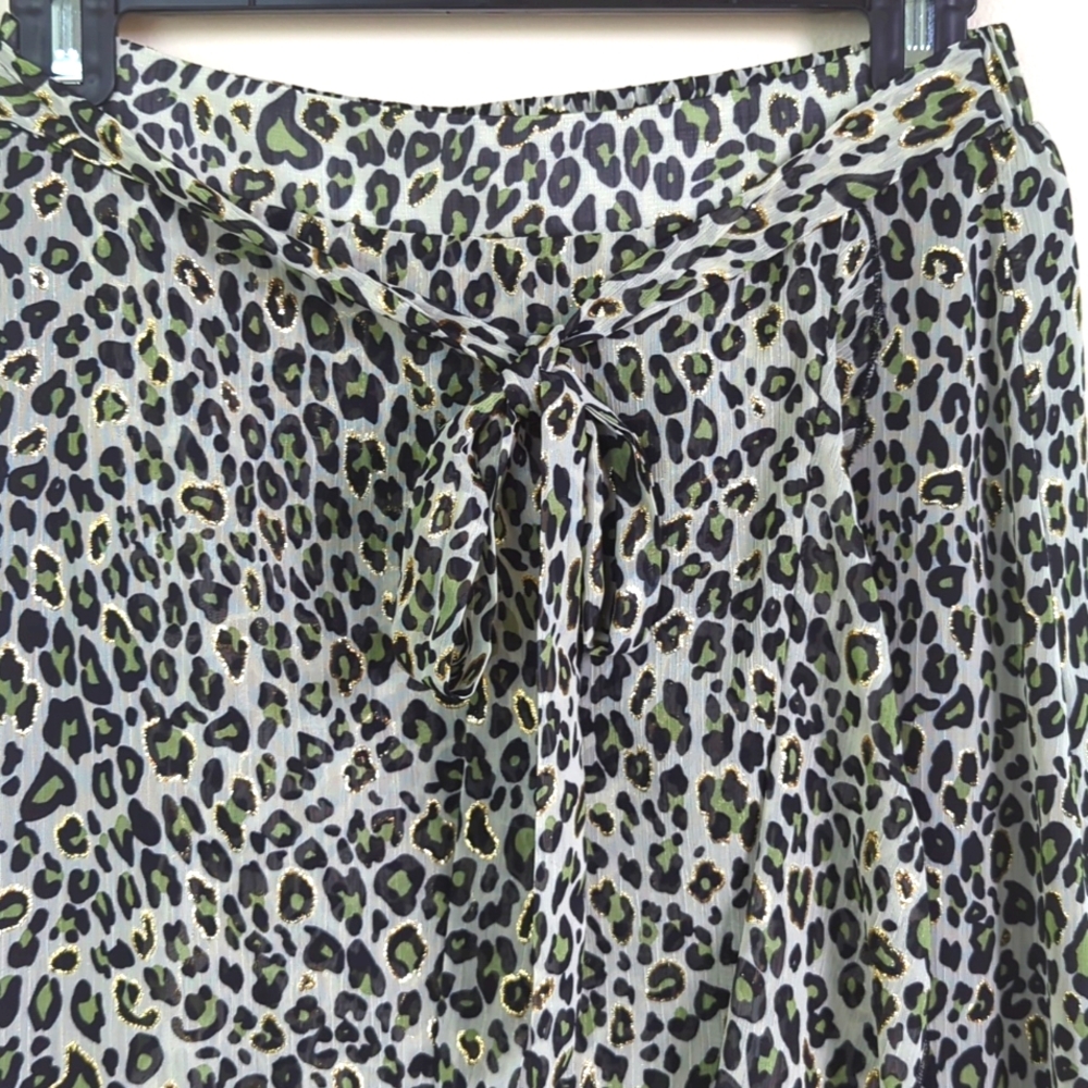 Nwt lili sidonio small ruffled skirt in a green, black and gold animal print.